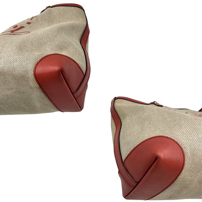 Angoli di una shopper Gucci Craft in tela beige, con finiture in pelle color rosa corallo. Dotata anche di una comoda pochette estraibile, usata, originale, second hand, in ottime condizioni.