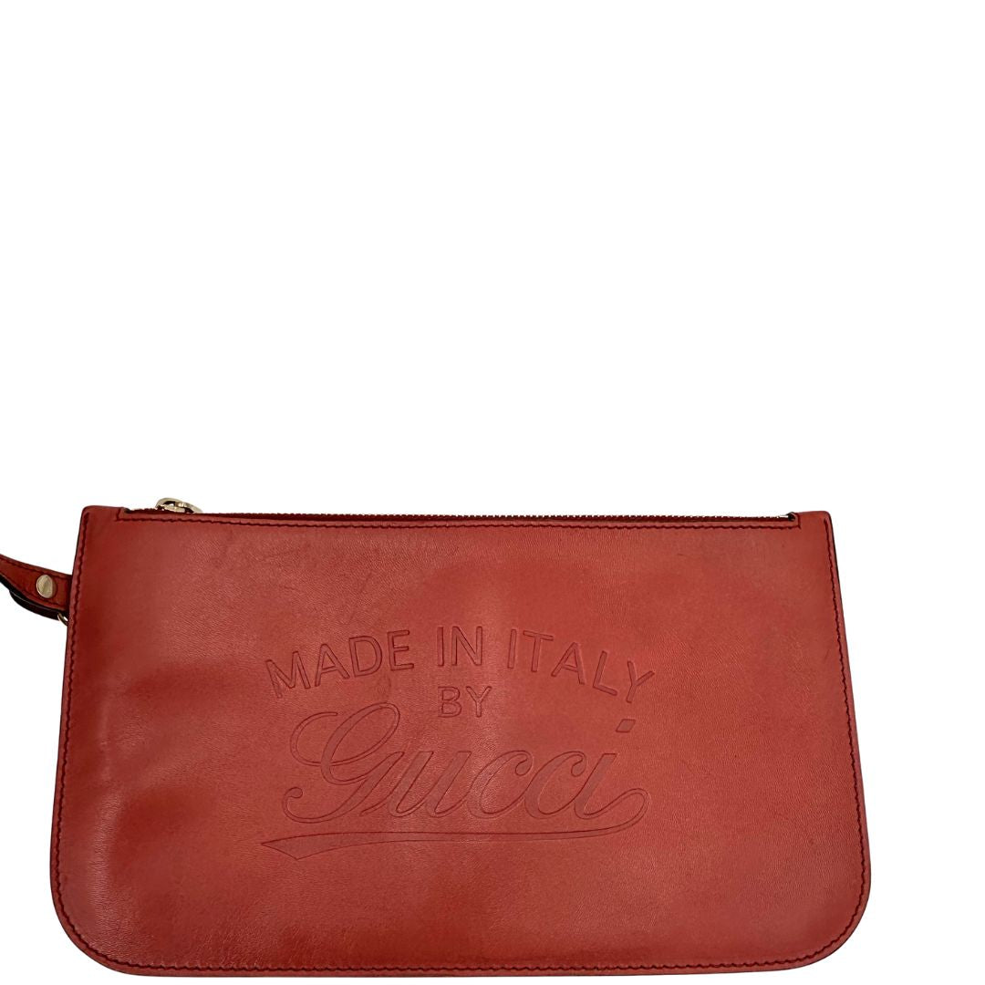 Pochette di una shopper Gucci Craft in tela beige, con finiture in pelle color rosa corallo, usata, originale, second hand, in ottime condizioni.