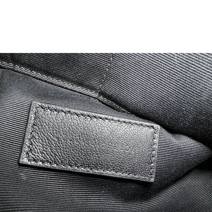 Codice di una pochette Saint Laurent in pelle bordeaux trapuntata, con parti metalliche dorate, usata, originale, second hand, in ottime condizioni.