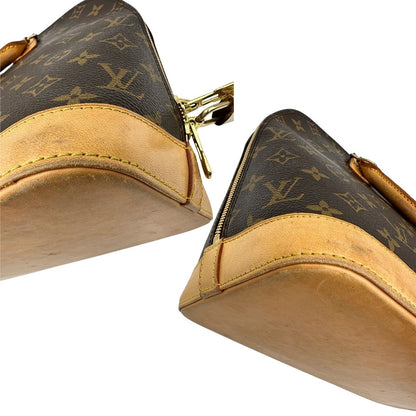 Angoli di una Louis Vuitton Alma in tela monogram nella versione PM, usata, originale, second hand, in ottime condizioni.