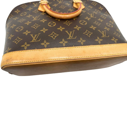 Base di una Louis Vuitton Alma in tela monogram nella versione PM, usata, originale, second hand, in ottime condizioni.
