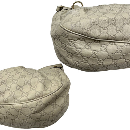 angoli borsa Gucci in morbida pelle color bianco avorio, di lusso, originale, ottime condizioni, usata.  