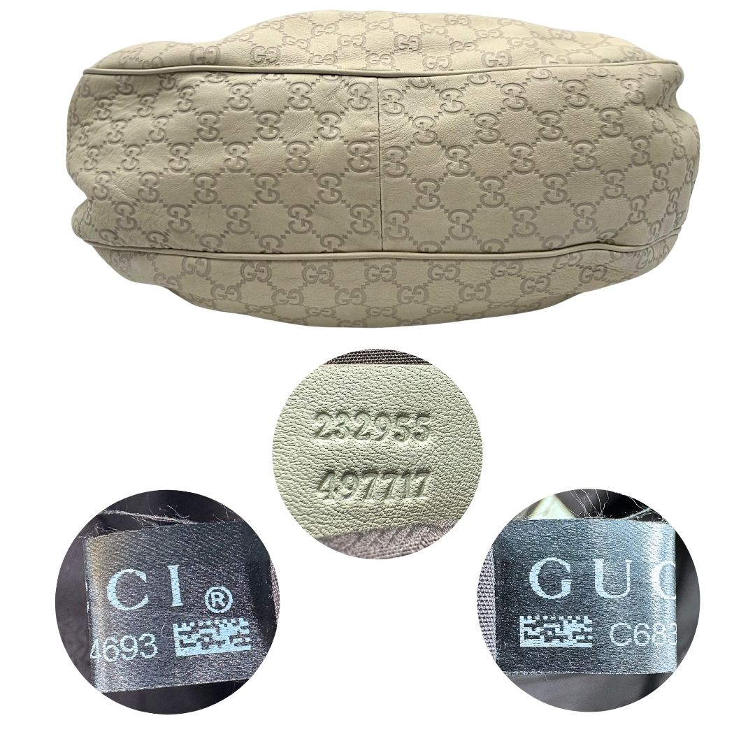 base borsa Gucci in morbida pelle color bianco avorio, di lusso, originale, ottime condizioni, usata. 