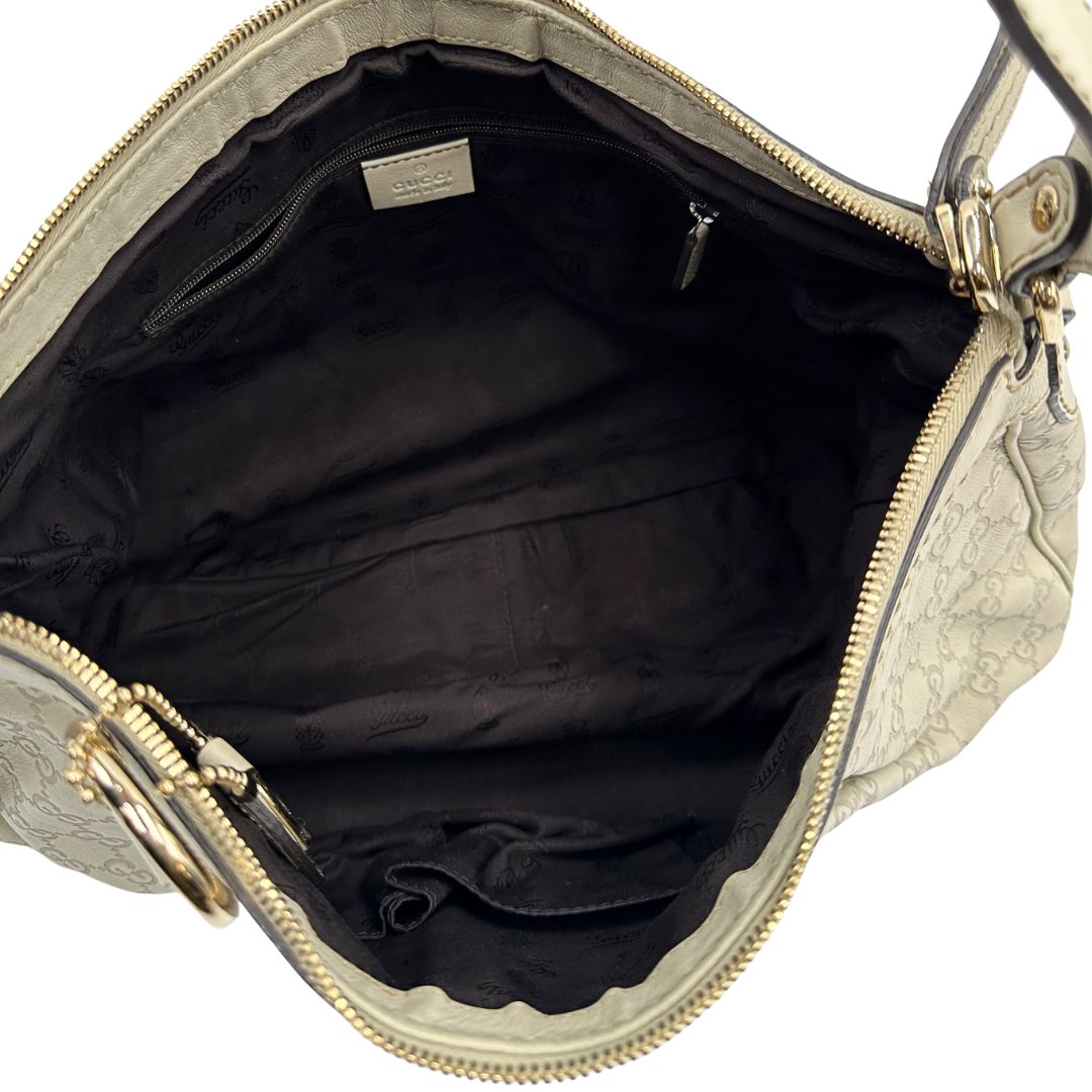 interno borsa Gucci in morbida pelle color bianco avorio, di lusso, originale, ottime condizioni, usata.  
