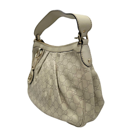 lato borsa Gucci in morbida pelle color bianco avorio, di lusso, originale, ottime condizioni, usata.  