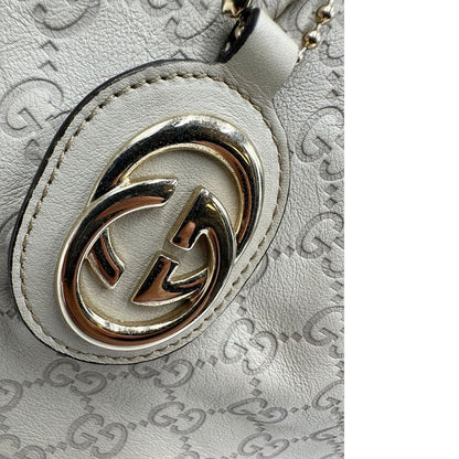 charm borsa Gucci in morbida pelle color bianco avorio, di lusso, originale, ottime condizioni, usata.  