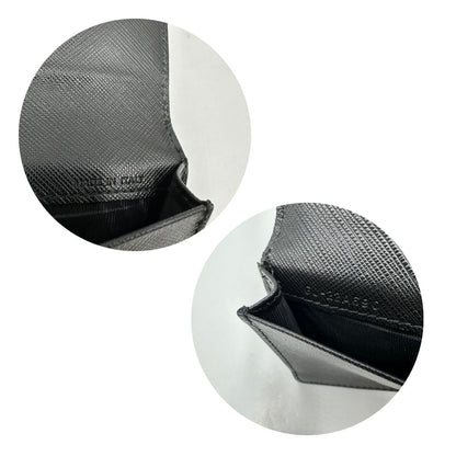 Portamonete Salvatore Ferragamo in pelle saffiano nera, di lusso, originale, ottime condizioni.