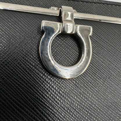 Portamonete Salvatore Ferragamo in pelle saffiano nera, di lusso, originale, ottime condizioni.