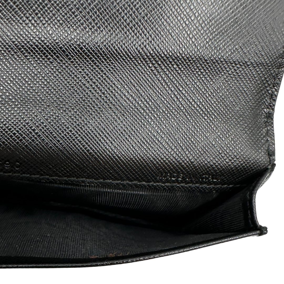 Portamonete Salvatore Ferragamo in pelle saffiano nera, di lusso, originale, ottime condizioni.