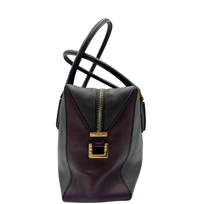 lato Bauletto Tod's in pelle color grigio antracite e viola melanzana, indossabile a spalla, di lusso, originale, ottime condizioni, usato. 