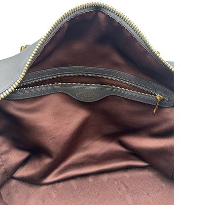 interno Bauletto Tod's in pelle color grigio antracite e viola melanzana, indossabile a spalla, di lusso, originale, ottime condizioni, usato. 