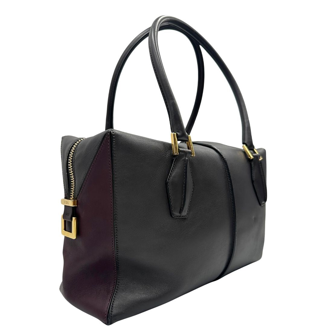 lato Bauletto Tod's in pelle color grigio antracite e viola melanzana, indossabile a spalla, di lusso, originale, ottime condizioni, usato. 