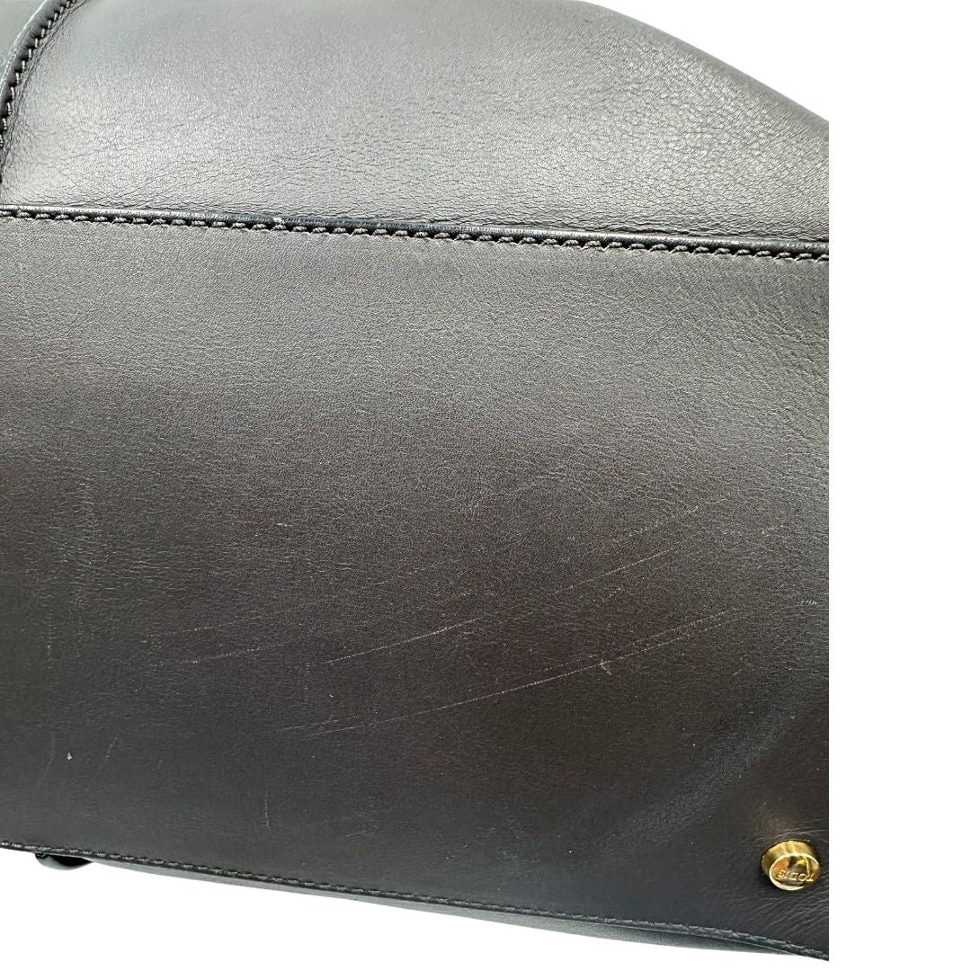 base Bauletto Tod's in pelle color grigio antracite e viola melanzana, indossabile a spalla, di lusso, originale, ottime condizioni, usato.