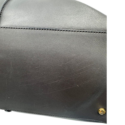 base Bauletto Tod's in pelle color grigio antracite e viola melanzana, indossabile a spalla, di lusso, originale, ottime condizioni, usato.