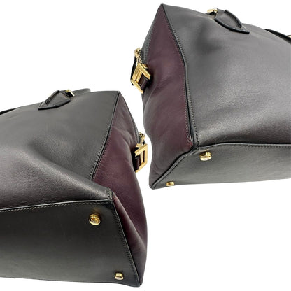 angoli Bauletto Tod's in pelle color grigio antracite e viola melanzana, indossabile a spalla, di lusso, originale, ottime condizioni, usato. 