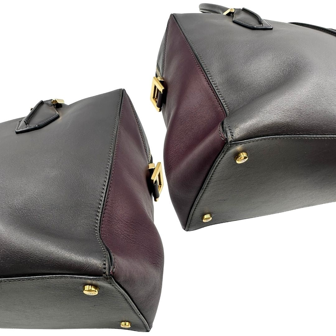 angoli Bauletto Tod's in pelle color grigio antracite e viola melanzana, indossabile a spalla, di lusso, originale, ottime condizioni, usato. 