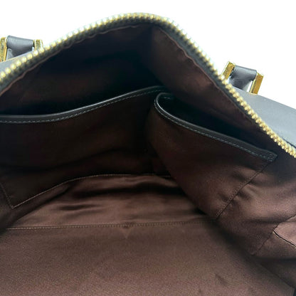 interno Bauletto Tod's in pelle color grigio antracite e viola melanzana, indossabile a spalla, di lusso, originale, ottime condizioni, usato. 