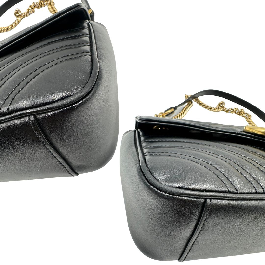 Angoli di una borsa Gucci Marmont nera in pelle con motivo chevron nella misura media, usata, originale, second hand, in ottime condizioni.