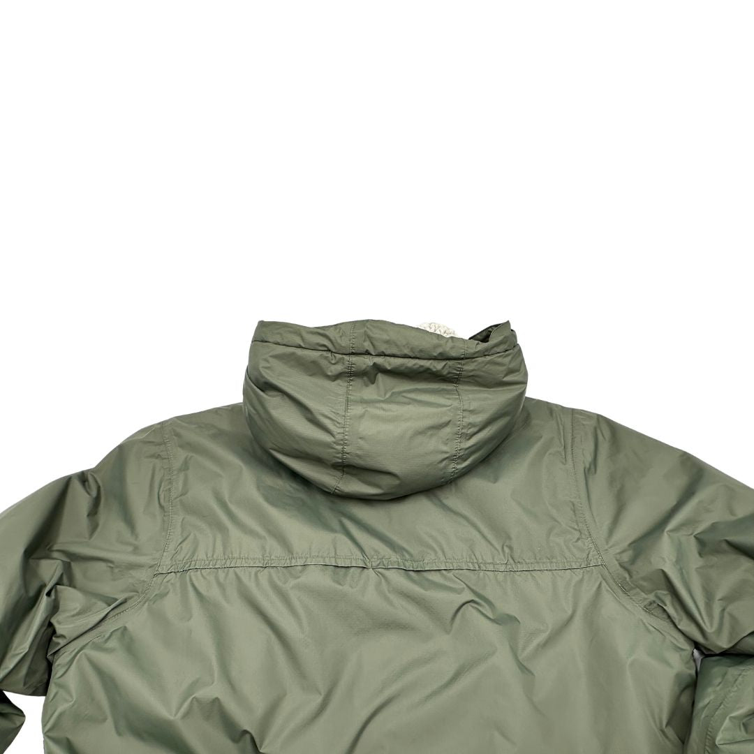Giubbino K-Way in 100% poliammide verde oliva, con morbido effetto shearling nella fodera interna,usato, originale, second hand, in ottime condizioni.