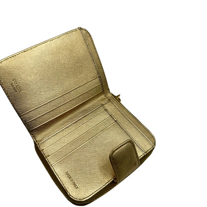 Portafoglio Prada in pelle dorata, di lusso, originale, ottime condizioni, usata.