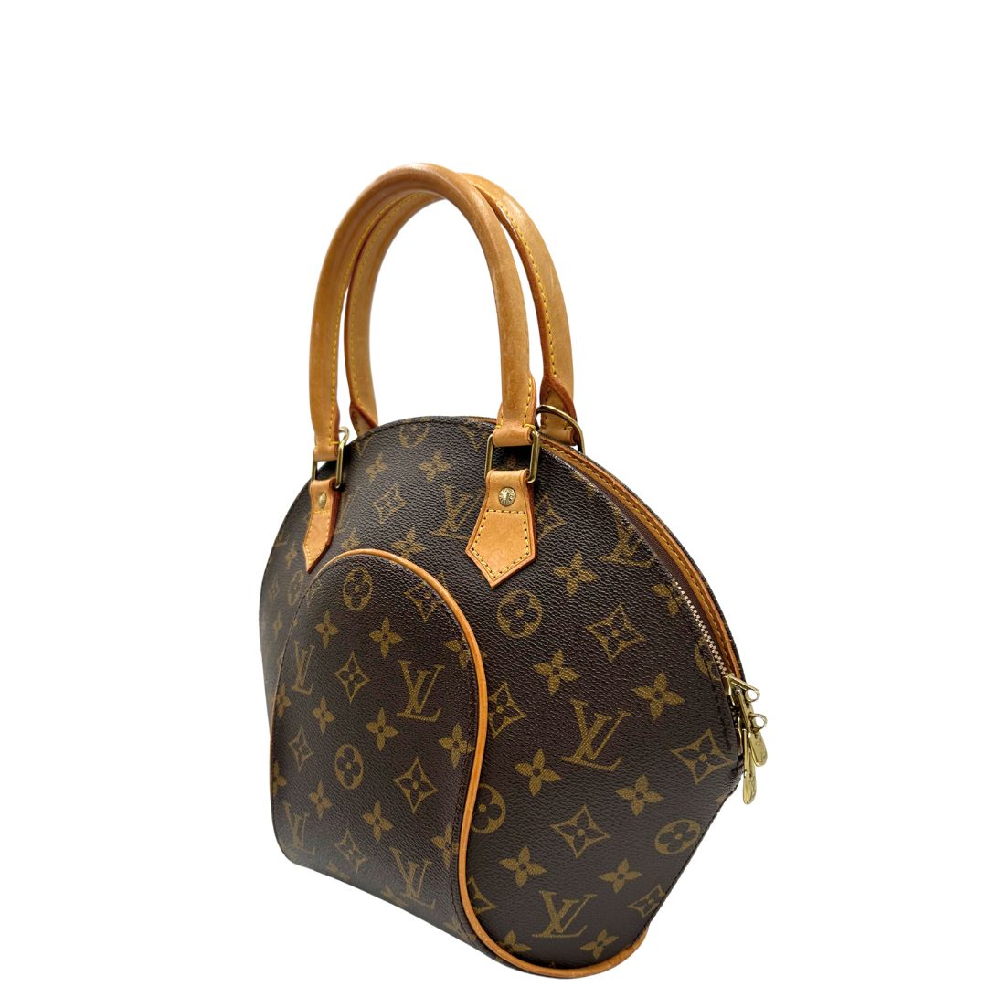 lato Borsa LV strutturata in tela monogram e vacchetta naturale, di lusso, originale, usata. 