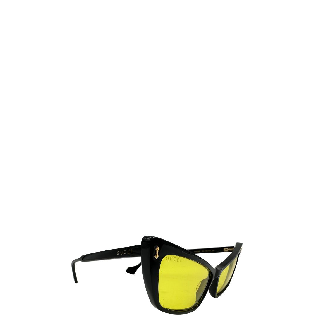 Occhiali da sole Gucci in acetato nero e lente gialla, di lusso, originale, usato.