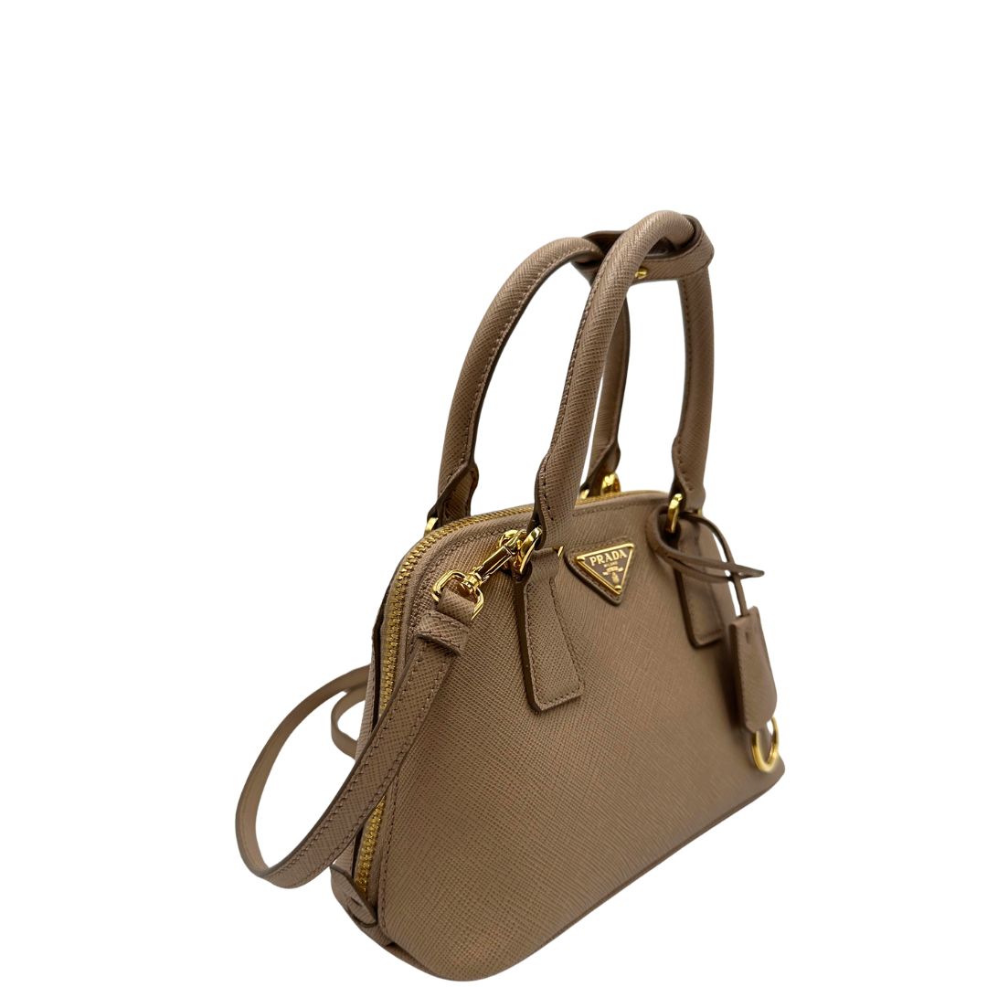 lato Borsa Prada Promenade in pelle saffiano beige nella versione mini, di lusso, originale, eccellenti condizioni, usata  