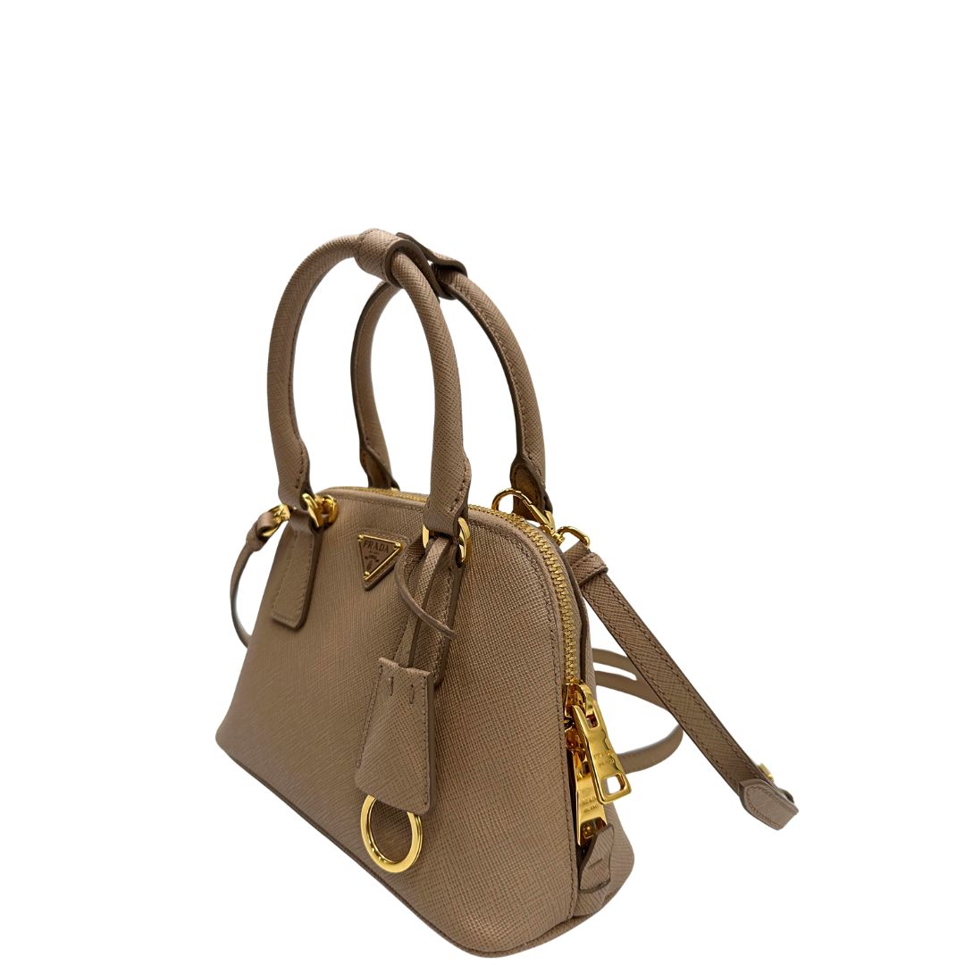 lato Borsa Prada Promenade in pelle saffiano beige nella versione mini, di lusso, originale, eccellenti condizioni, usata  
