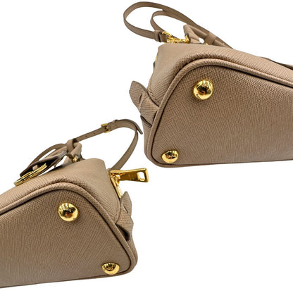 angoli Borsa Prada Promenade in pelle saffiano beige nella versione mini, di lusso, originale, eccellenti condizioni, usata  