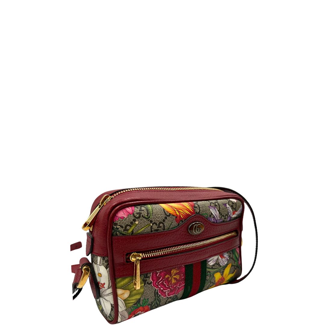 lato Borsa Gucci in canvas con trama floreale e pelle rossa, di lusso, originale, ottime condizioni, usata. 