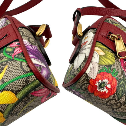 angoli Borsa Gucci in canvas con trama floreale e pelle rossa, di lusso, originale, ottime condizioni, usata. 