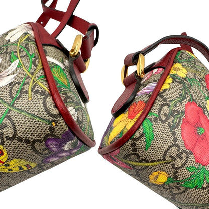angoli Borsa Gucci in canvas con trama floreale e pelle rossa, di lusso, originale, ottime condizioni, usata. 