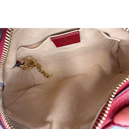 interno Borsa Gucci in canvas con trama floreale e pelle rossa, di lusso, originale, ottime condizioni, usata.