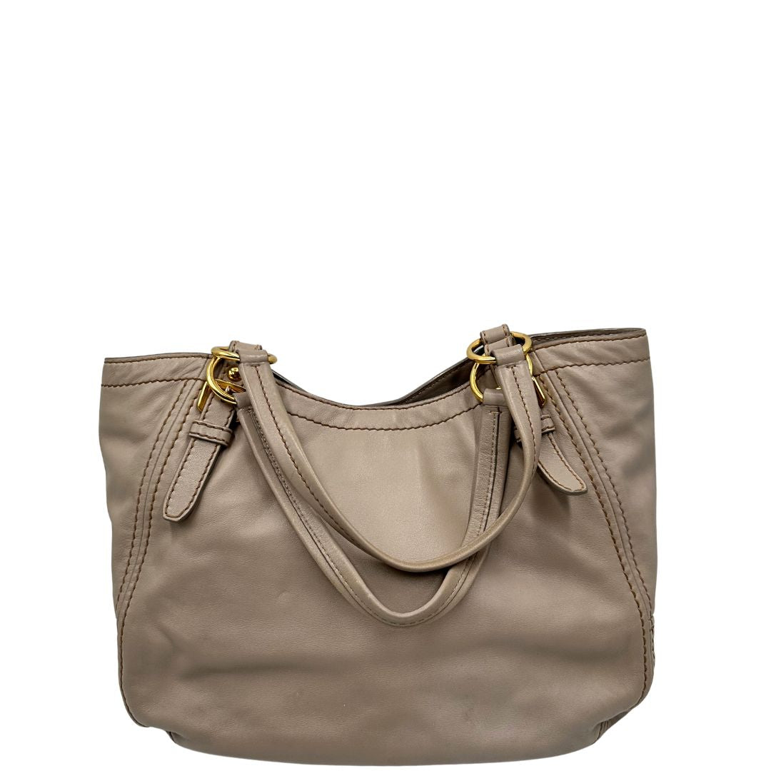 retro  Borsa Prada in pelle color taupe, di lusso, originale, ottime condizioni, usata. 
