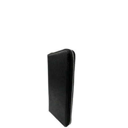 Laterale, Portafoglio Prada in pelle saffiano nero e hardware argentato. Originale, usato, di lusso, in ottime condizioni.