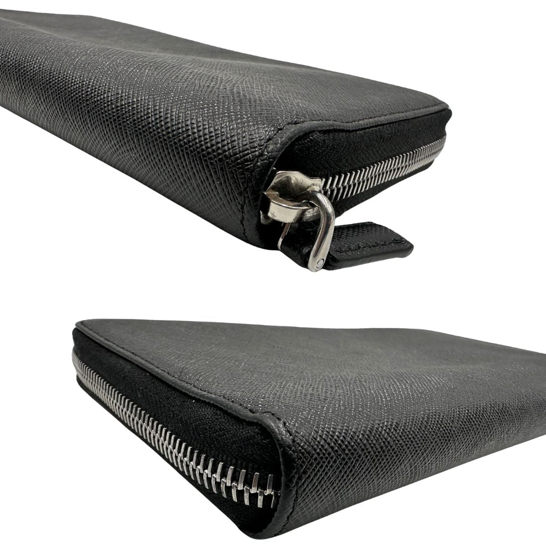 Angoli, Portafoglio Prada in pelle saffiano nero e hardware argentato. Originale, usato, di lusso, in ottime condizioni.