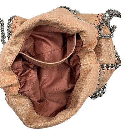 interno Borsa Falabella con base colore rosa effetto olografico, nella versione mini, di lusso originale, ottime condizioni, usata. 