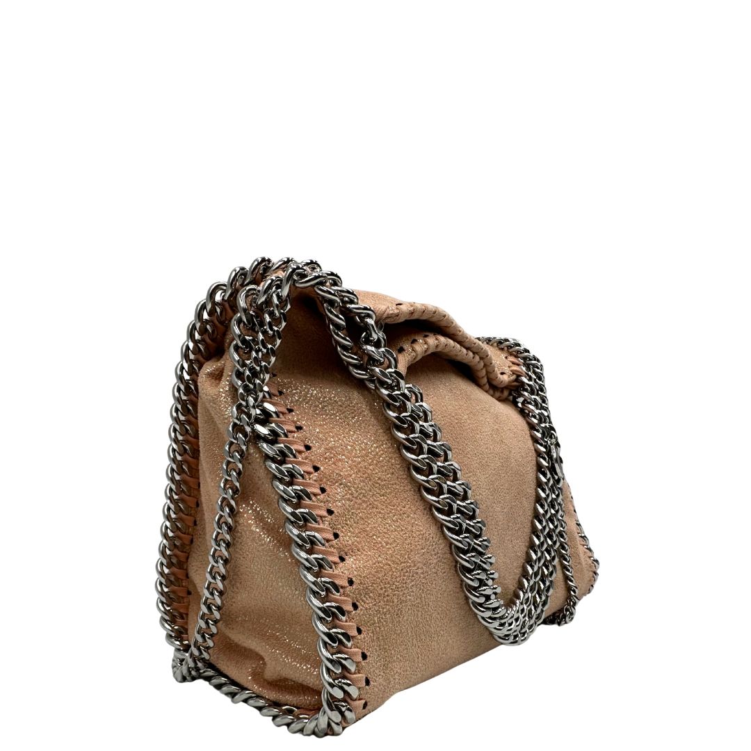 lato Borsa Falabella con base colore rosa effetto olografico, nella versione mini, di lusso originale, ottime condizioni, usata. 