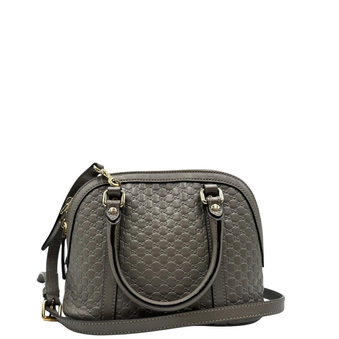 retro Borsa Gucci in pelle microgucissima grigia, di lusso, originale, ottime condizioni, usata. 