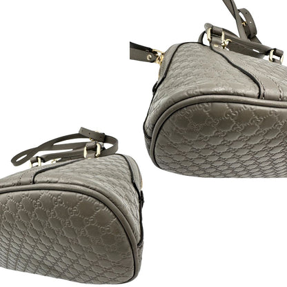 angoliu Borsa Gucci in pelle microgucissima grigia, di lusso, originale, ottime condizioni, usata. 