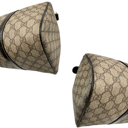 Bauletto Gucci GG con finiture in pelle marroni, di lusso, originale, ottime condizioni, usato.
