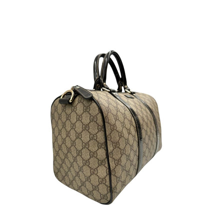 lato Bauletto Gucci GG con finiture in pelle marroni, di lusso, originale, ottime condizioni, usato. 