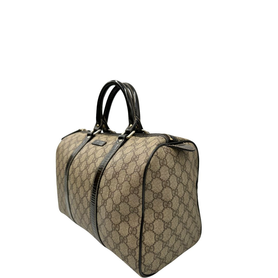 Bauletto Gucci GG con finiture in pelle marroni, di lusso, originale, ottime condizioni, usato.