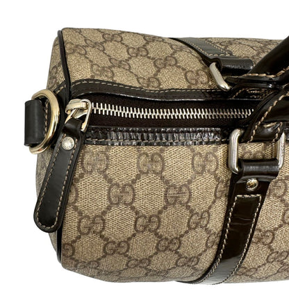 Bauletto Gucci GG con finiture in pelle marroni, di lusso, originale, ottime condizioni, usato.