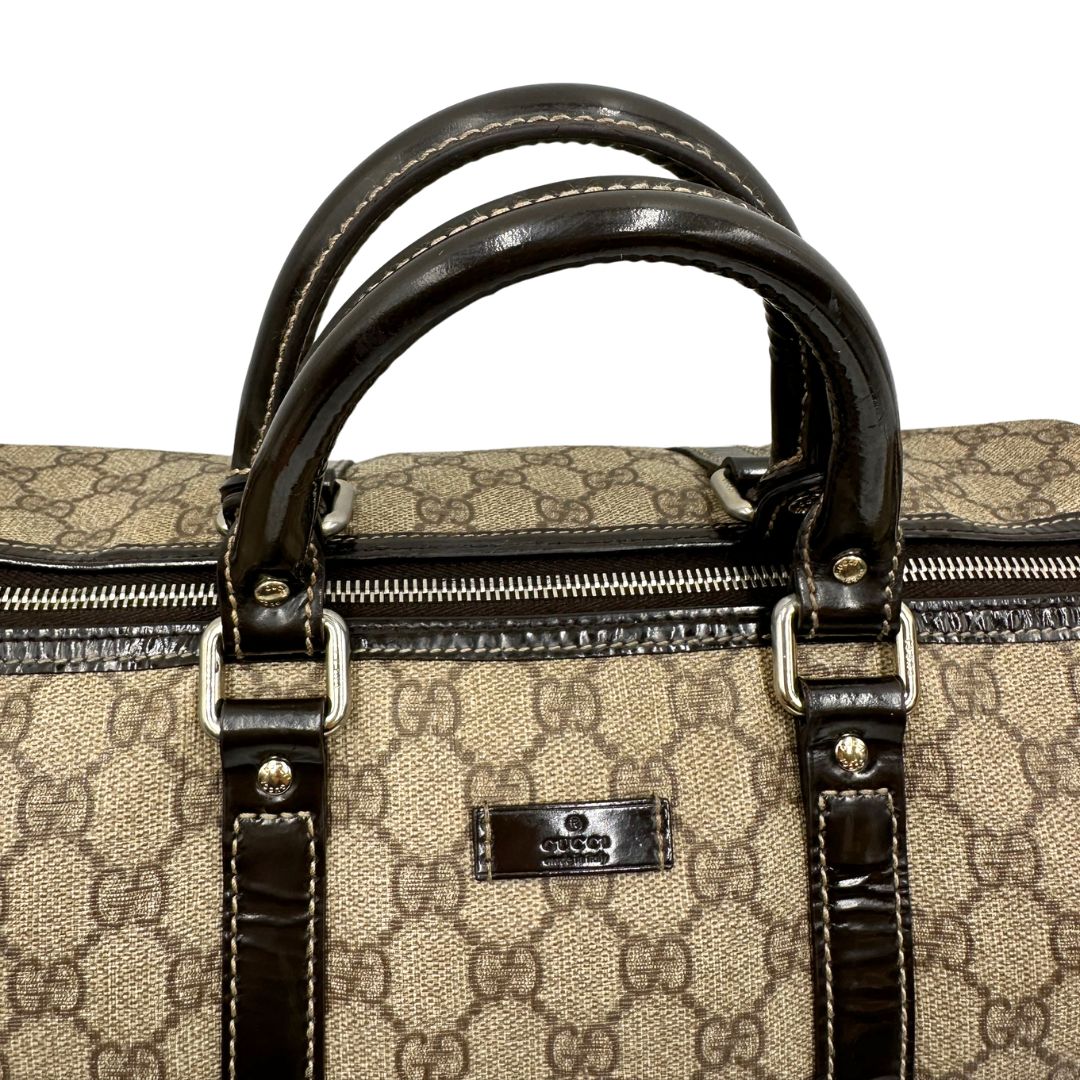Bauletto Gucci GG con finiture in pelle marroni, di lusso, originale, ottime condizioni, usato.