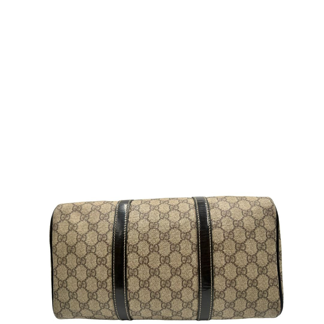 Bauletto Gucci GG con finiture in pelle marroni, di lusso, originale, ottime condizioni, usato.