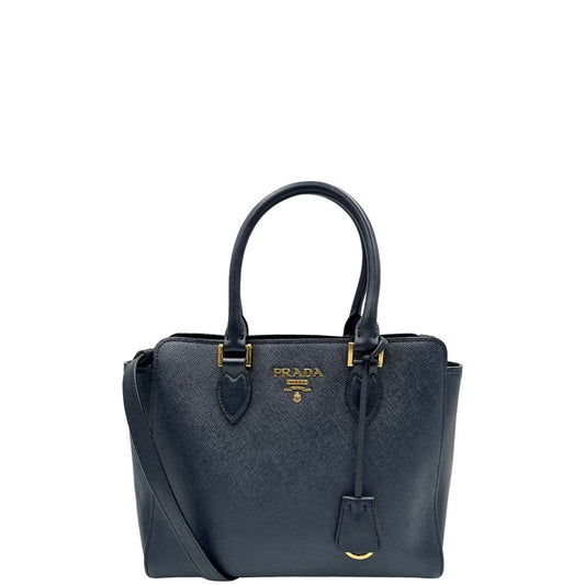 front  Borsa Prada in pelle saffiano blu navy, puoi portarla comodamente a spalla, tracolla o a mano, di lusso, originale, ottime condizioni, usata.