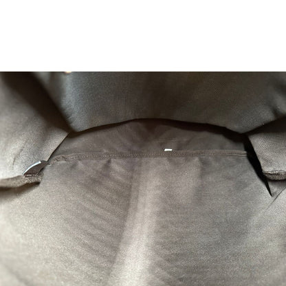Interno, Borsa Prada in tessuto color marrone con finiture in pelle marroni e parti metalliche argentate; Indossabile a spalla. Originale, usata, di lusso, in ottime condizioni.