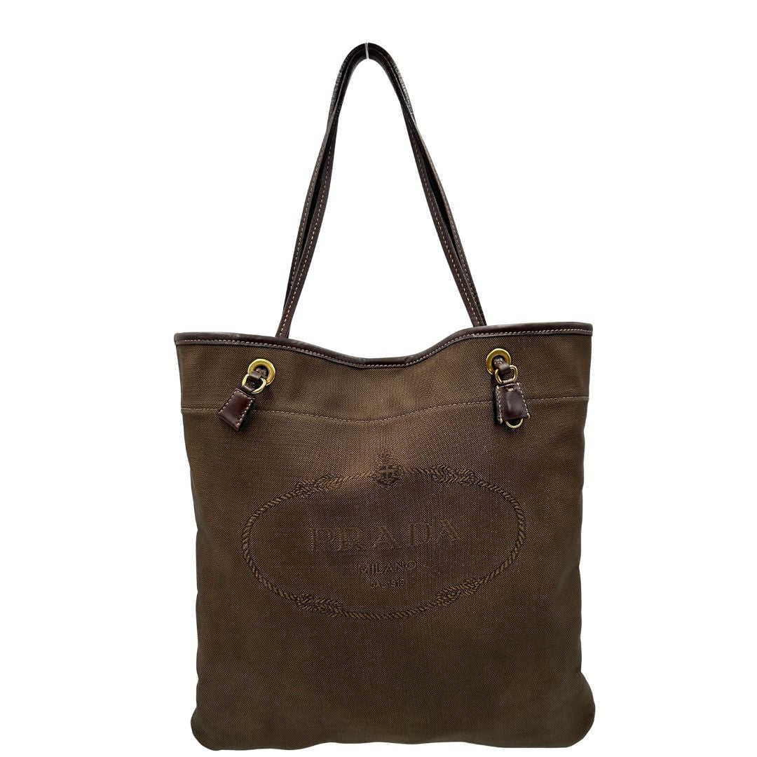 Front, Borsa Prada in tessuto color marrone con finiture in pelle marroni e parti metalliche argentate; Indossabile a spalla. Originale, usata, di lusso, in ottime condizioni.