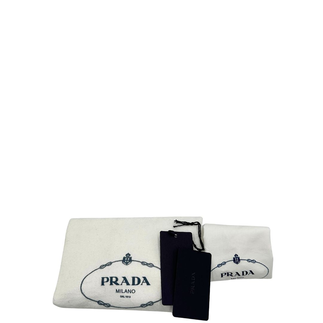 Dustbag di una borsa a tracolla Prada in re-nylon giallo con pouch amovibile, usata, originale, second hand, in condizioni eccellenti.